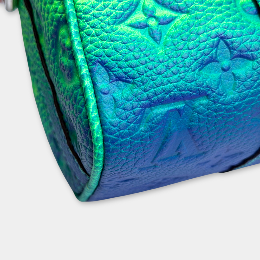 Microchipped Louis Vuitton Limited Taurillon Clemence Illusion Keepall XS Bag Kelly's Authentic Boutique