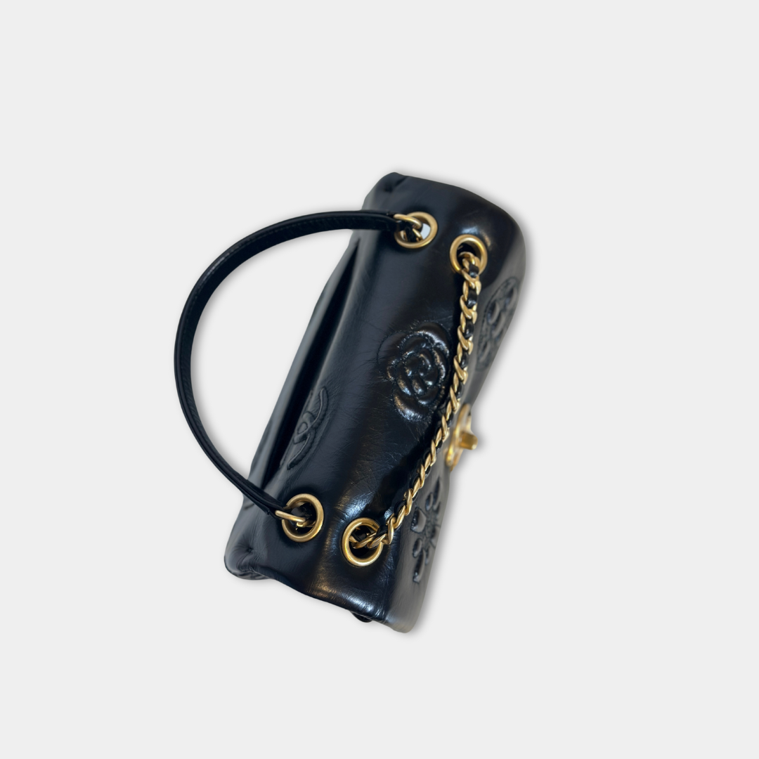 Chanel Black Aged Calfskin Camellia Embossed Flap Bag Kelly's Authentic Boutique