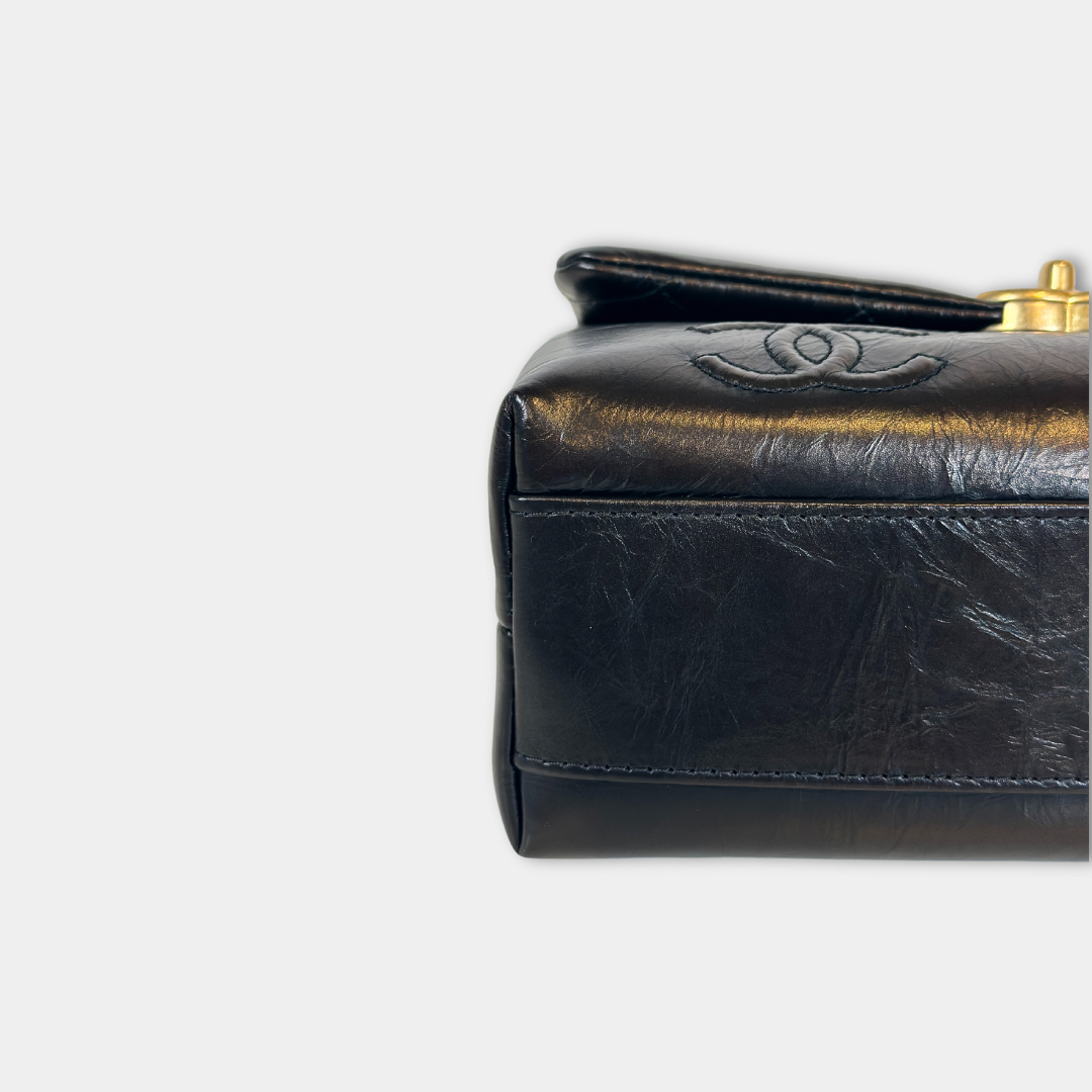 Chanel Black Aged Calfskin Camellia Embossed Flap Bag Kelly's Authentic Boutique