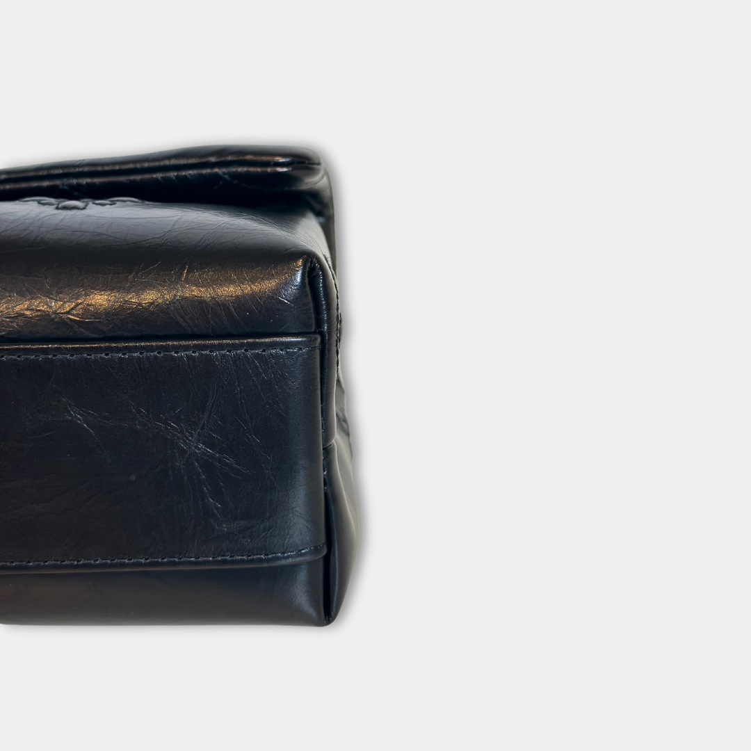 Chanel Black Aged Calfskin Camellia Embossed Flap Bag Kelly's Authentic Boutique