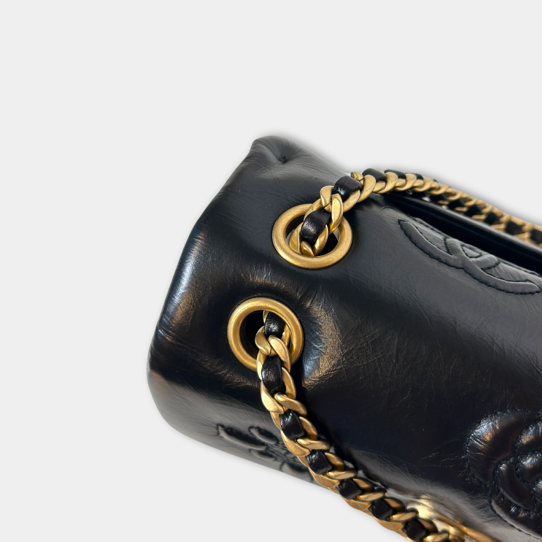 Chanel Black Aged Calfskin Camellia Embossed Flap Bag Kelly's Authentic Boutique