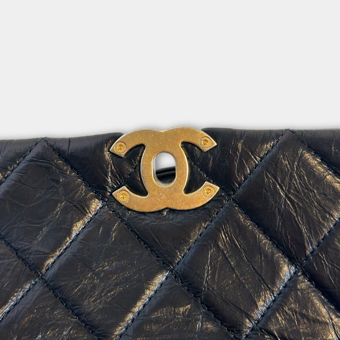 Chanel Black Aged Calfskin Camellia Embossed Flap Bag Kelly's Authentic Boutique