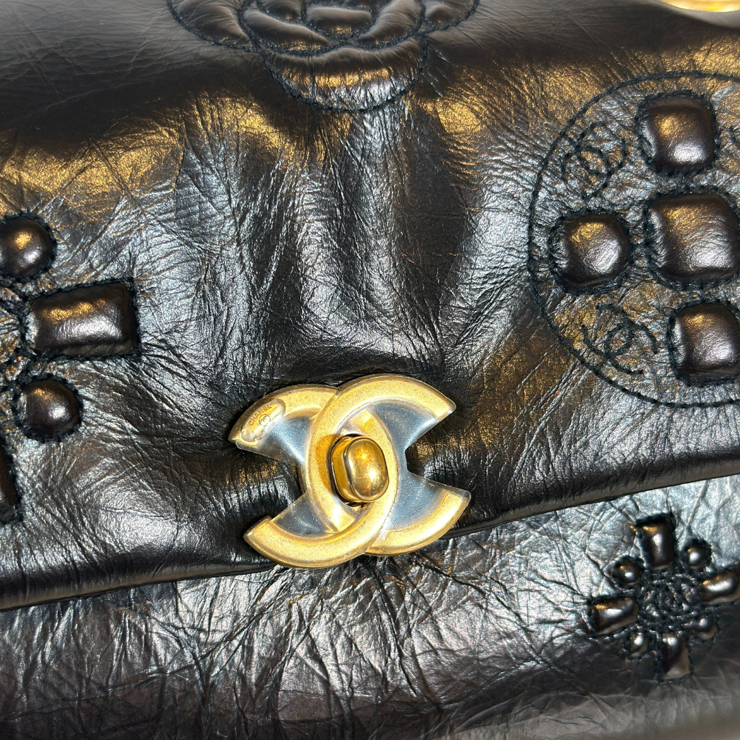 Chanel Black Aged Calfskin Camellia Embossed Flap Bag Kelly's Authentic Boutique