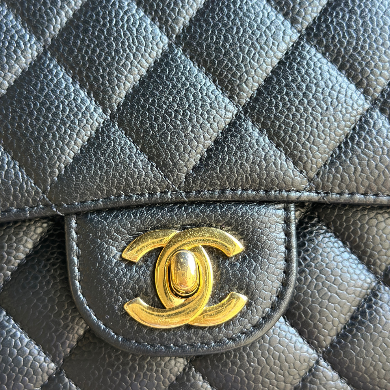 Chanel Black Caviar Medium Classic Flap with GHW Kelly's Authentic Boutique