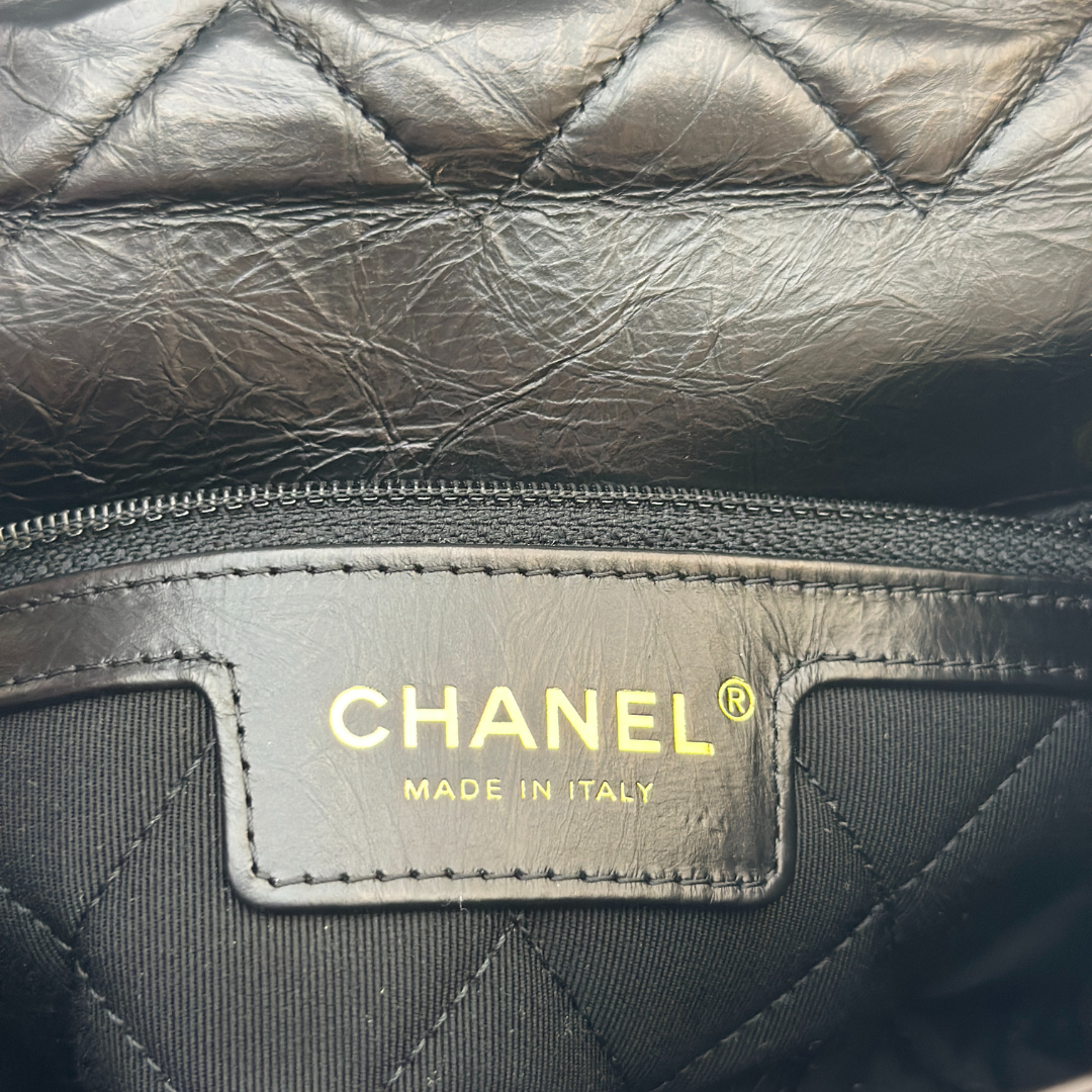 Chanel Black Aged Calfskin Camellia Embossed Flap Bag Kelly's Authentic Boutique