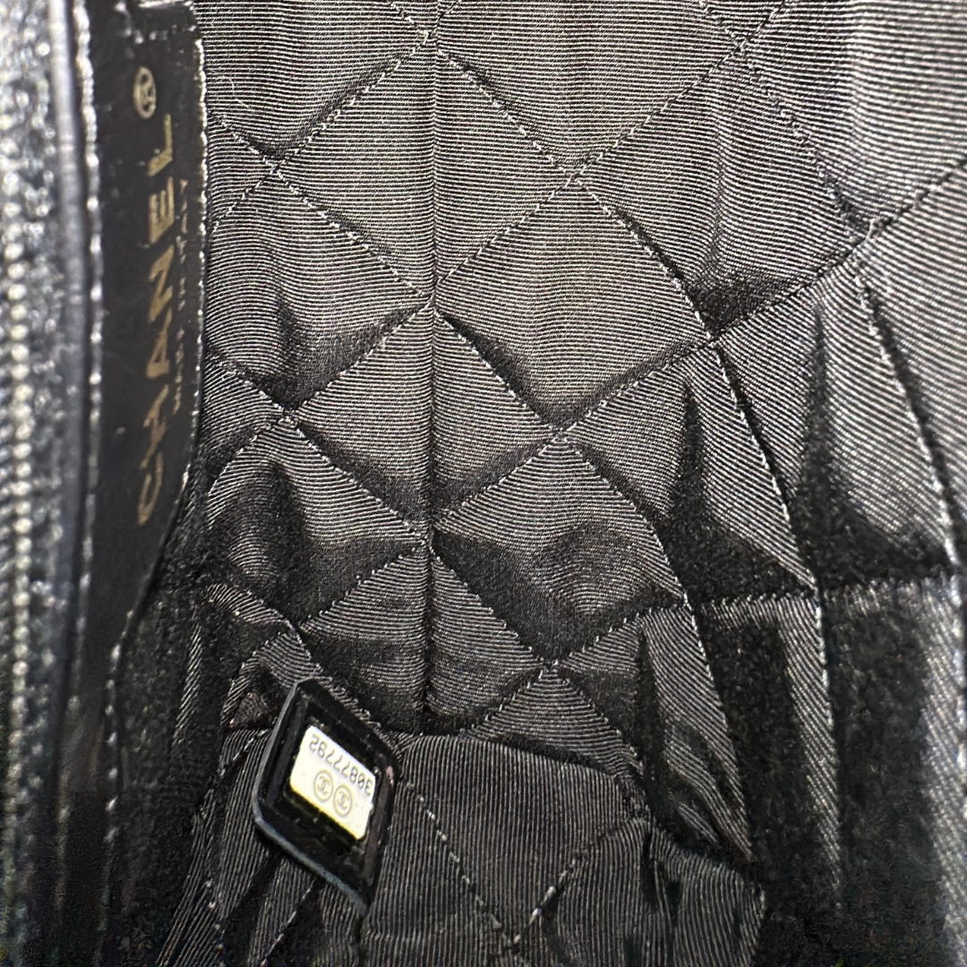 Chanel Black Aged Calfskin Camellia Embossed Flap Bag Kelly's Authentic Boutique