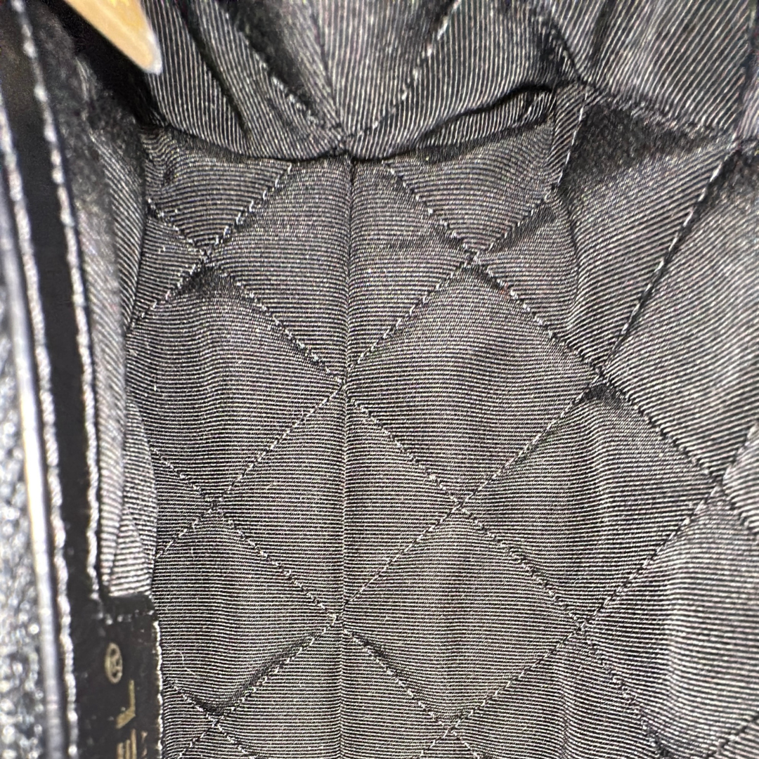 Chanel Black Aged Calfskin Camellia Embossed Flap Bag Kelly's Authentic Boutique