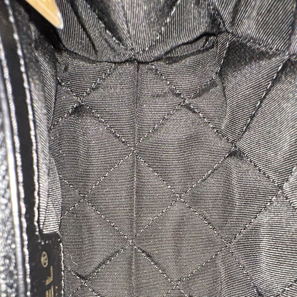 Chanel Black Aged Calfskin Camellia Embossed Flap Bag Kelly's Authentic Boutique