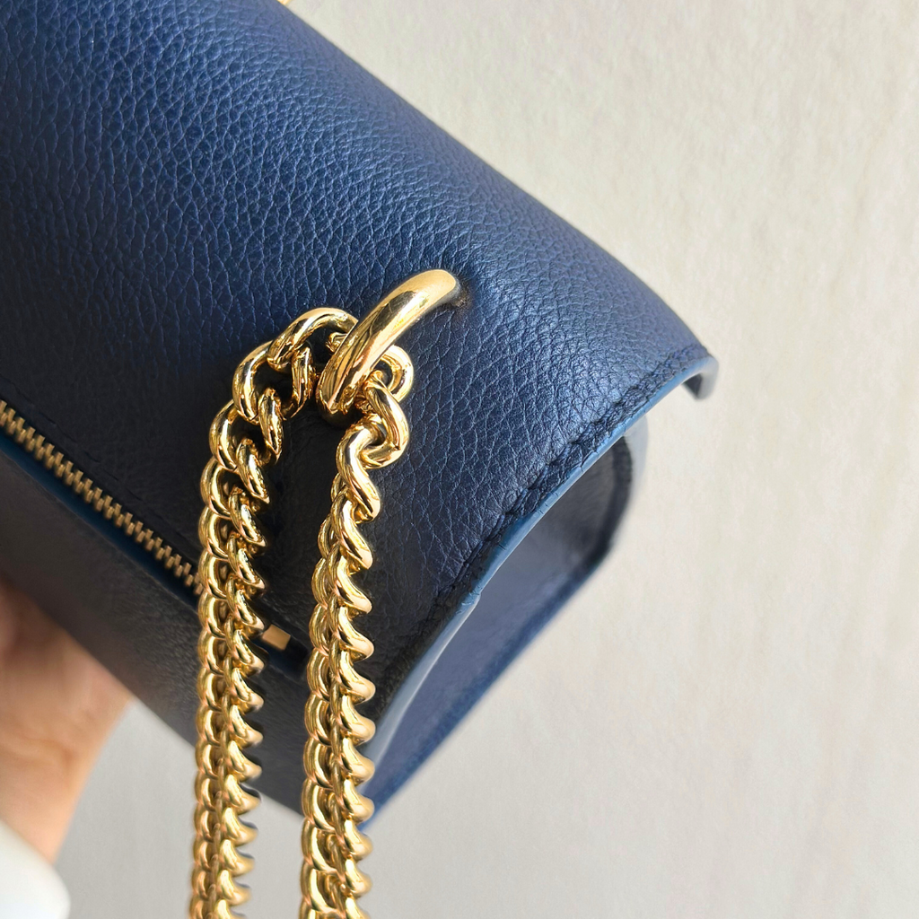 Louis Vuitton Microchipped MyLockMe Creme Navy Chain Shoulder Bag - Kelly's Authentic Boutique
