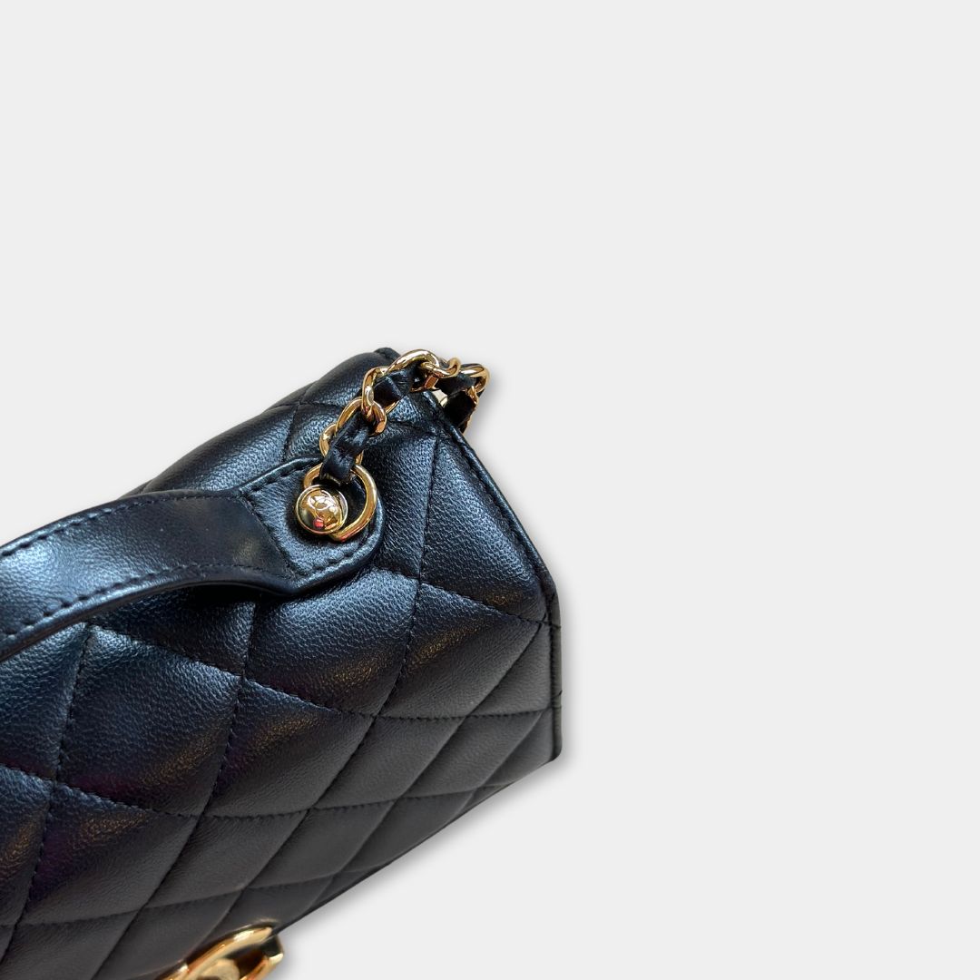 Microchipped Chanel Black 21K Gold Mini Flap Bag Kelly's Authentic Boutique