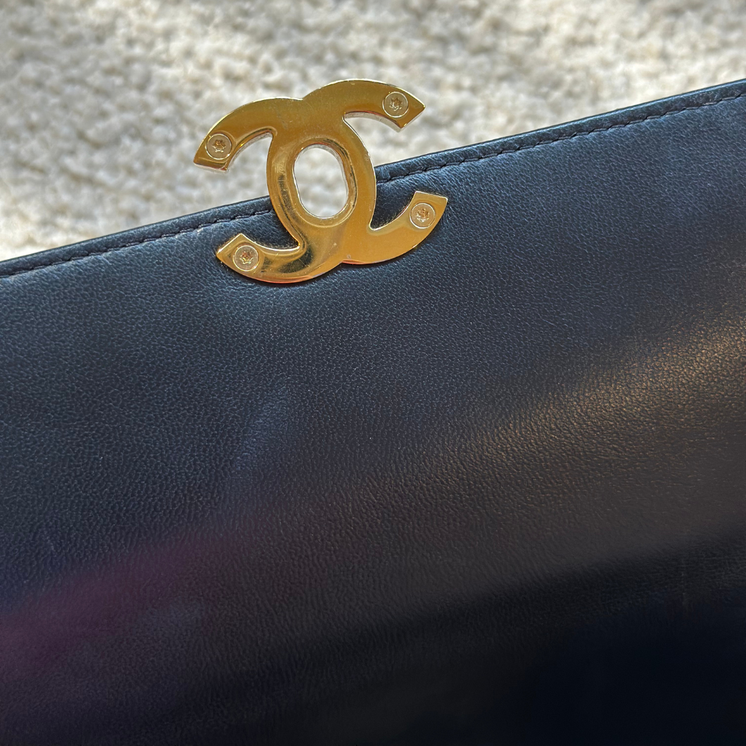 Microchipped Chanel Black 21K Gold Mini Flap Bag Kelly's Authentic Boutique