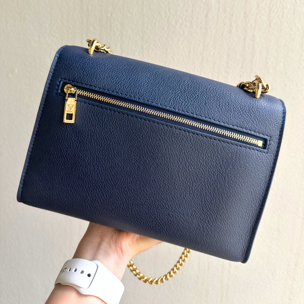 Louis Vuitton Microchipped MyLockMe Creme Navy Chain Shoulder Bag - Kelly's Authentic Boutique