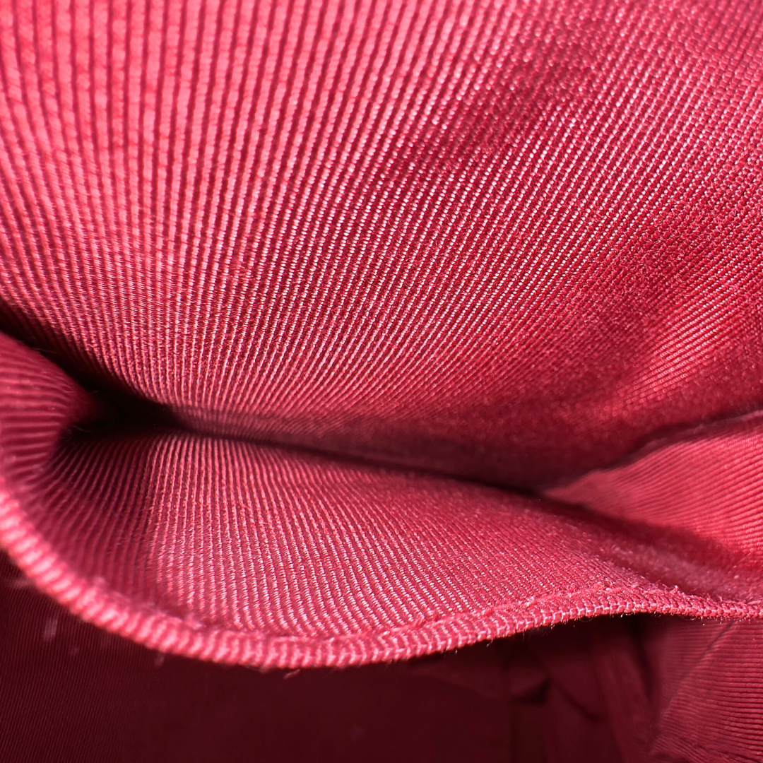 Chanel Red Quilted Lambskin Drawstring Bucket Bag Kelly's Authentic Boutique