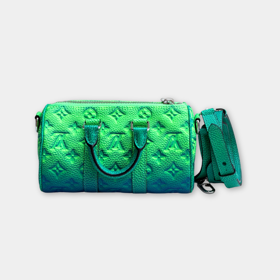 Microchipped Louis Vuitton Limited Taurillon Clemence Illusion Keepall XS Bag Kelly's Authentic Boutique