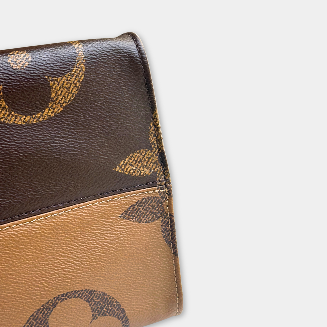 Louis Vuitton Monogram Reverse Onthego GM Kelly's Authentic Boutique