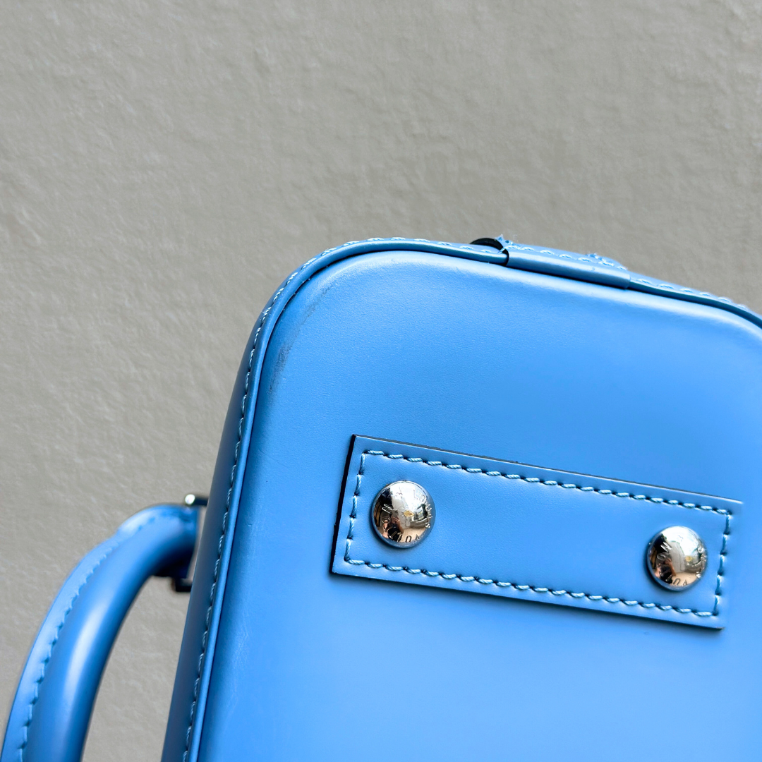 Louis Vuitton Baby Blue Epi Alma BB Kelly's Authentic Boutique