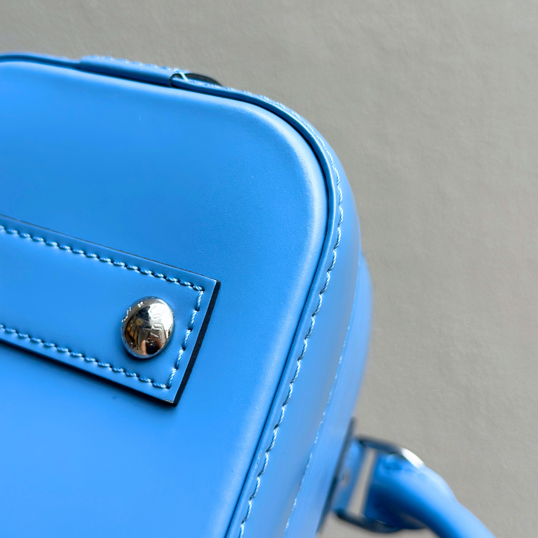 Louis Vuitton Baby Blue Epi Alma BB Kelly's Authentic Boutique